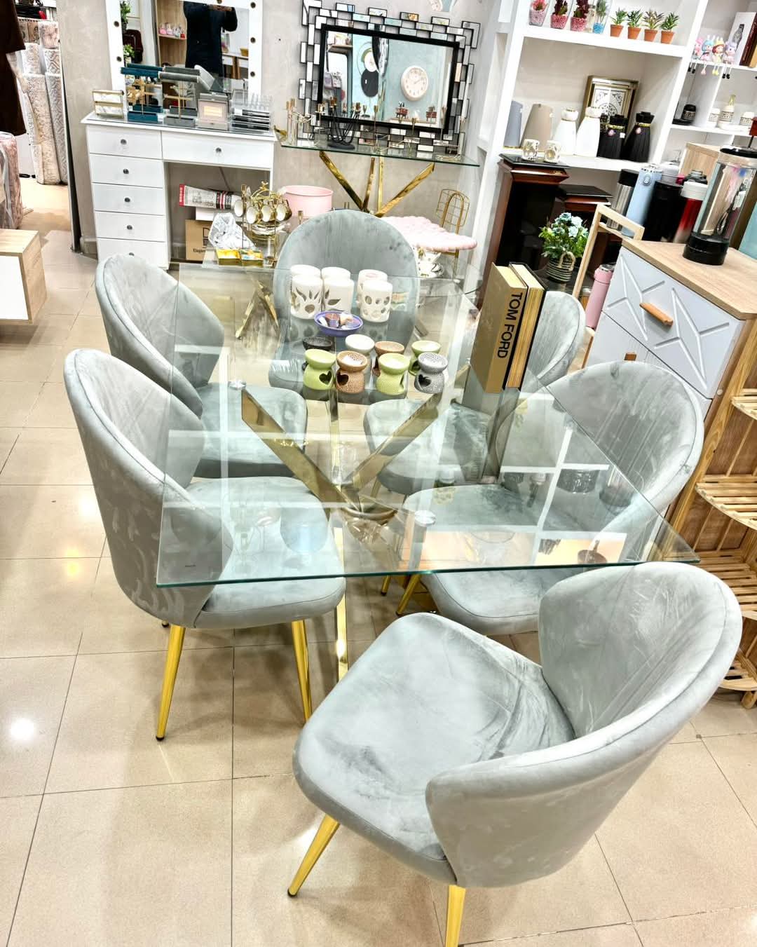 Table en verre pied inox