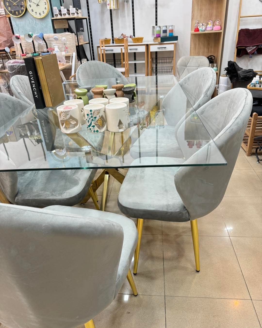 Table en verre pied inox